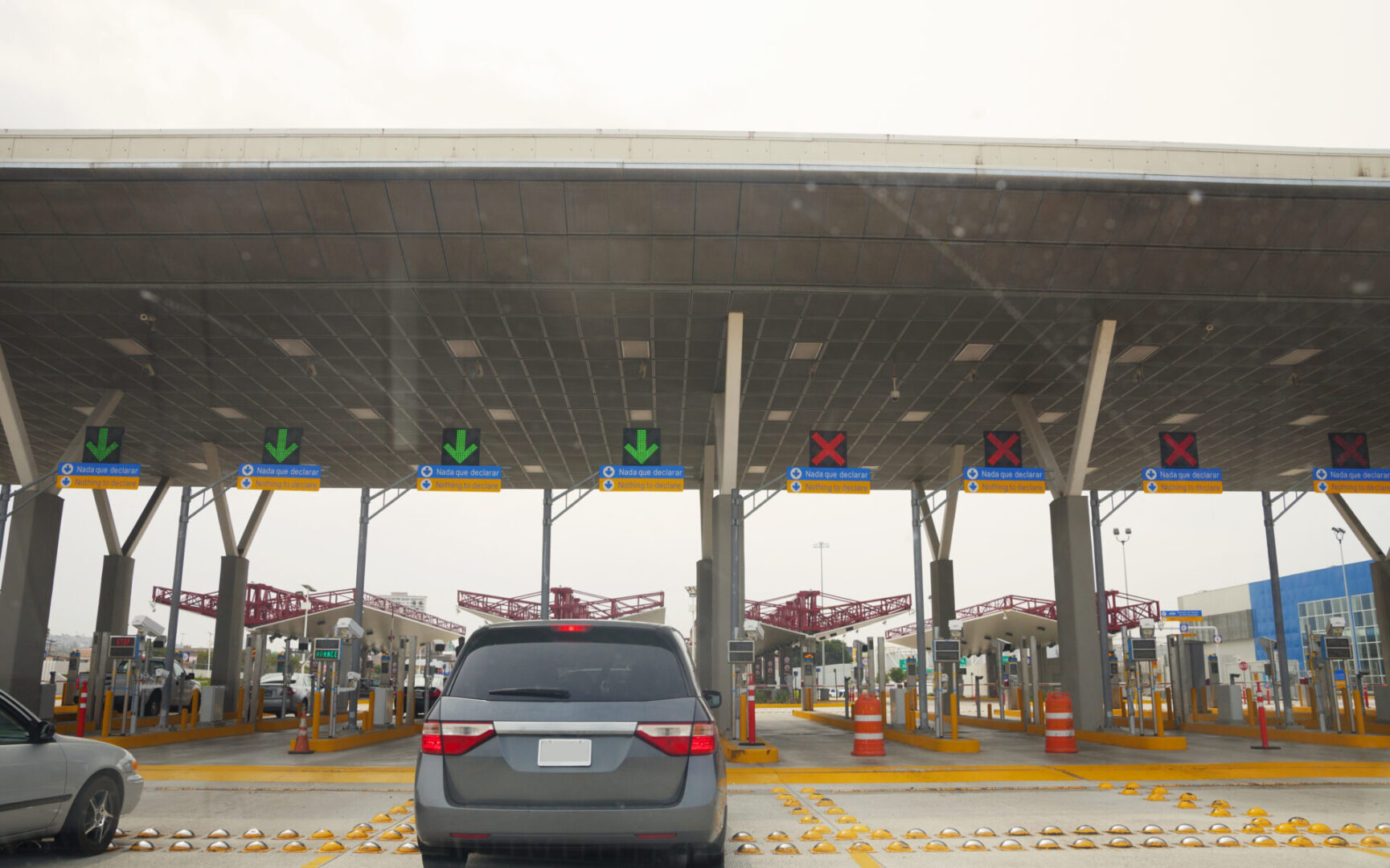 Border crossing, vehicle at checkpoint.