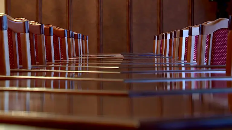 Empty conference room chairs and table.