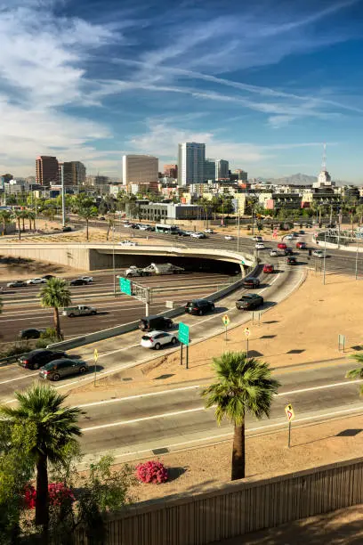 Rush hour traffic jam and cityscape skyline in the city core of Phoenix Arizona USA